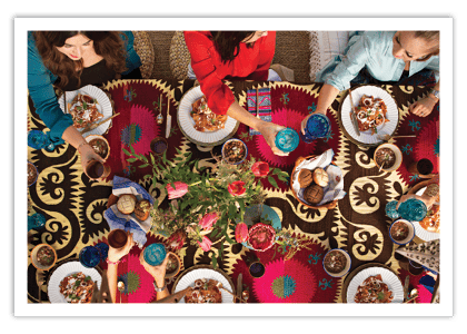 Bird's eye view of decorative table with 3 women